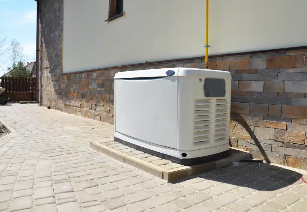 Home generator on side of house